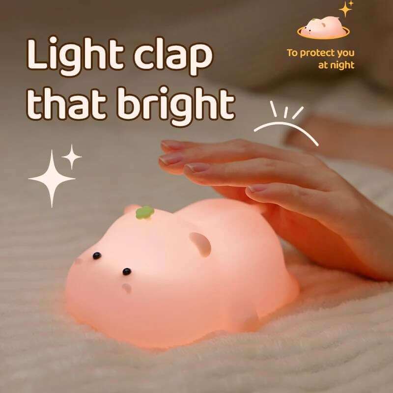 Baby Hippo Night Light with clap activation, soft silicone design, and soothing glow.