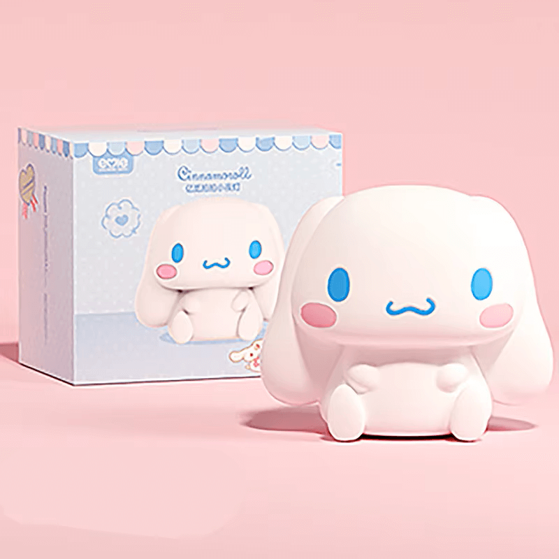 Kawaii Cinnamoroll anime night light with packaging on a pink background.