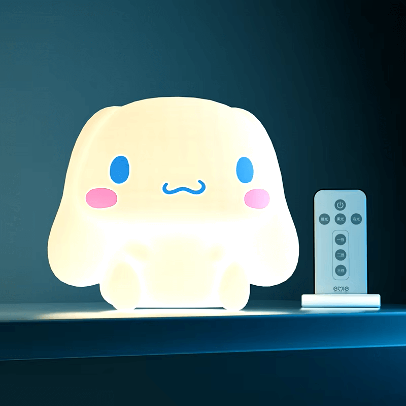 Kawaii Cinnamoroll Anime Night Light with remote control on a table.