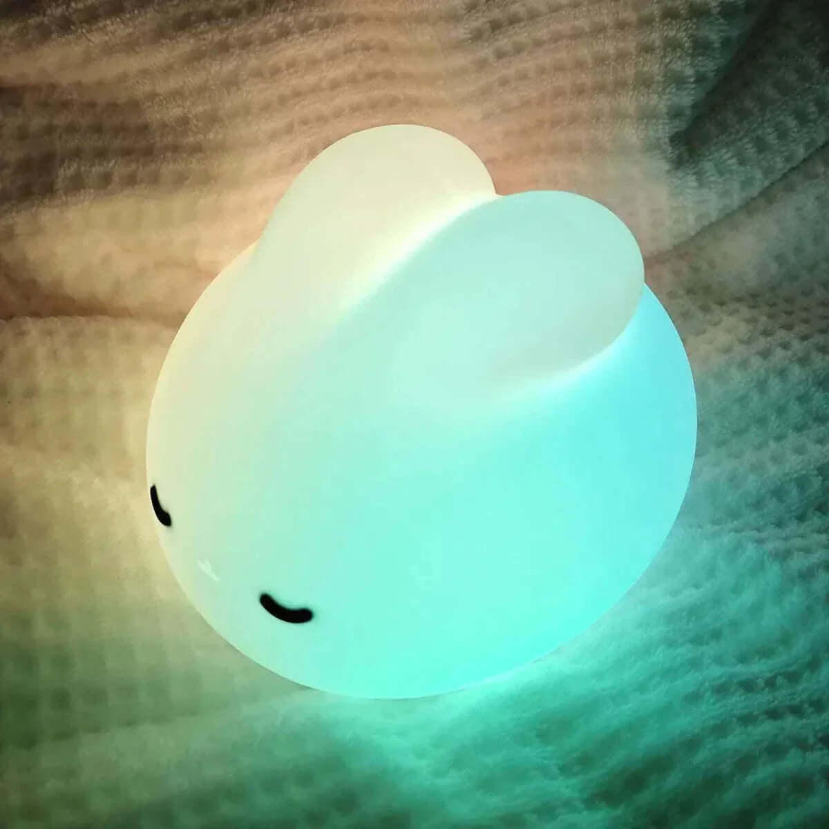 Eco-friendly Baby Bunny Night Light with soft, calming glow, USB rechargeable design, and safe silicone material for kids.