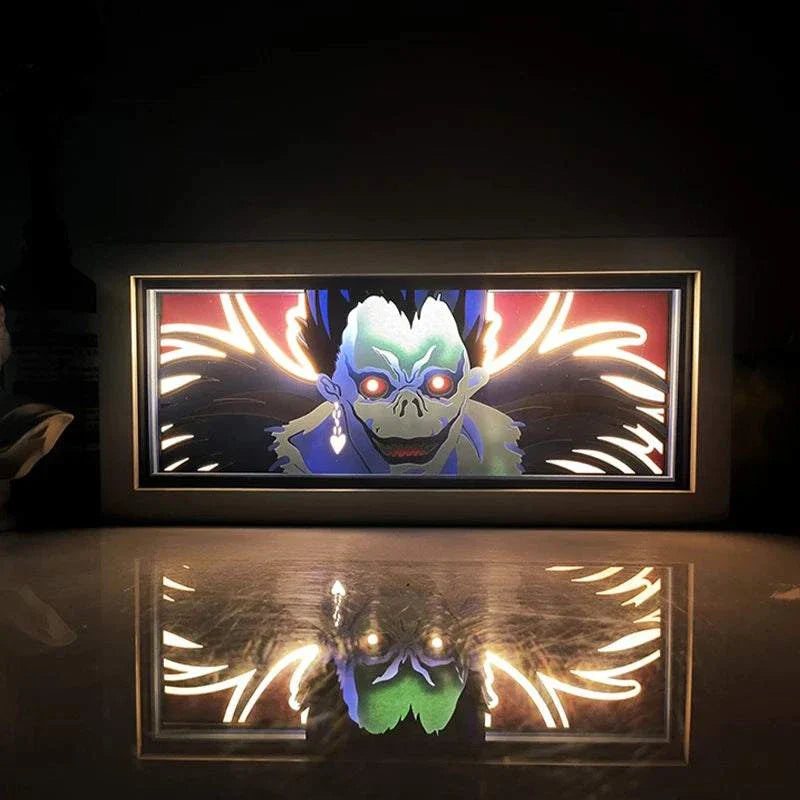 Ryuk Death Note light box with eerie glow featuring sinister grin and piercing eyes.