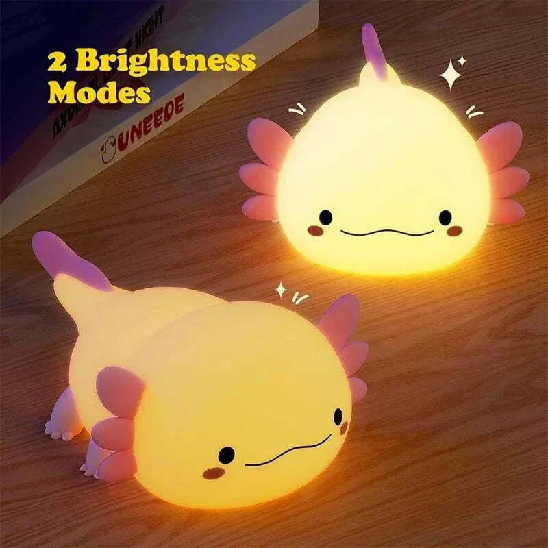 Cute Axolotl Night Light with two brightness modes on a wooden surface.